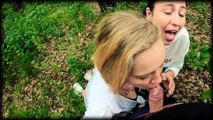 Two Girlfriends Suck Cock in the Woods – Threesome Outdoor Blowjob – Public POV